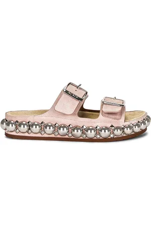 Alaïa Bombe Mules in Neutral