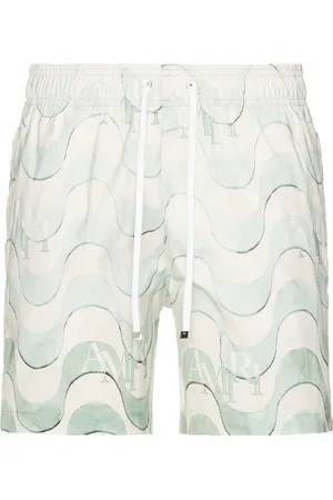 AMIRI Staggered Swim Trunk in Teal