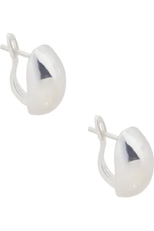 LOREN STEWART Puff Huggie Earrings in Metallic Silver