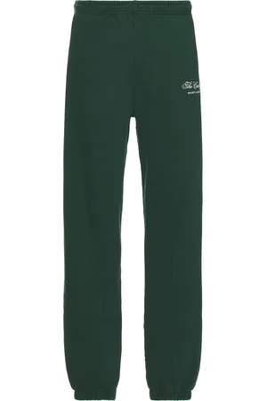 Sporty & Rich X Hotel Carlyle Script Embroidered Sweatpant in Dark Green