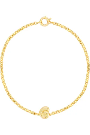 Timeless Pearly Shell Charm Bracelet in Metallic