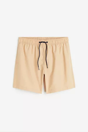 H&M Swim shorts with water-activated pattern