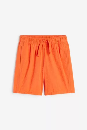 KINDRED elasticated-waistband cotton shorts - Orange