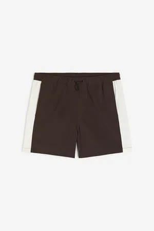 Valentino Garavani Logo Printed drop-crotch Shorts - Farfetch