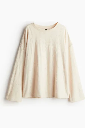 H&M Oversized worn-look top