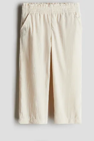 H&M Crinkled velour trousers