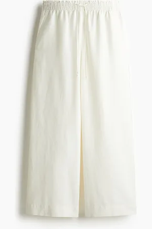 H&M Cropped linen-blend trousers