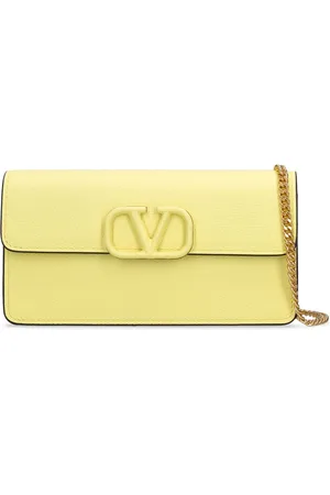 VALENTINO GARAVANI: VLogo wristlet clutch bag - Yellow Cream