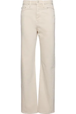 Totême Twisted Seam Mid Rise Denim Jeans
