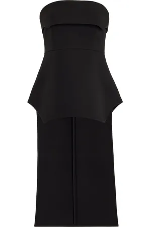 The latest collection of black peplum tops