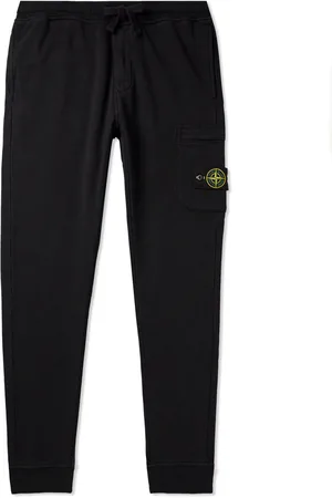 Stone Island Tapered Logo-Appliquéd Garment-Dyed Cotton-Jersey Sweatpants