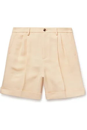 VALENTINO GARAVANI Wide-Leg Pleated Canvas Shorts