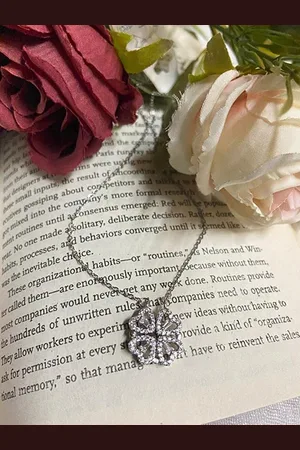 Jewels Galaxy Silver-Plated Stone-Studded Openable Magnet Pendant with Chain