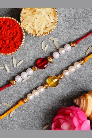 eCraftIndia Pack of 2 Rakhis and Roli Chawal Pack