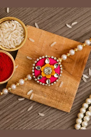 eCraftIndia Pink & Orange Designer Floral Rakhi and Roli Chawal Pack