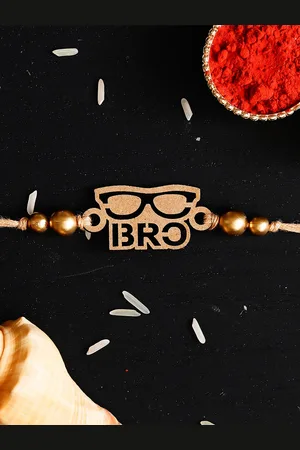 eCraftIndia Gold Toned Designer Bro Rakhi and Roli Chawal Pack