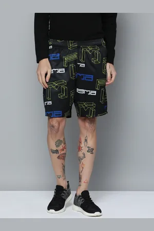 PUMA Men Geometric & Typography Print Regular Fit Mid-Rise Breakaway AOP Sports Sustainable Shorts