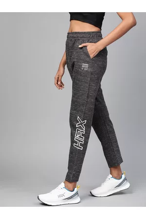 HRX Women Slim Trousers - Women Black Melange Solid Slim Fit Training Track Pants