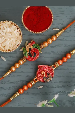 eCraftIndia Pack of 2 Designer Rakhi & Roli Chawal