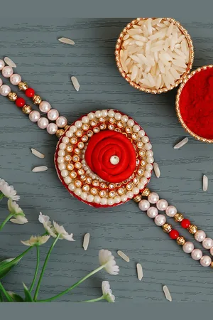 eCraftIndia Red Floral Pearl Rakhi & Roli Chawal Pack