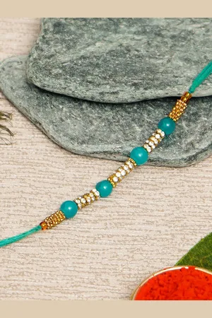 eCraftIndia Gold-Toned & Sea Green Designer Pearl Rakhi & Roli Chawal Pack