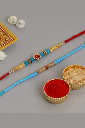 eCraftIndia Multicoloured Pack of 2 Rakhi and Roli Chawal