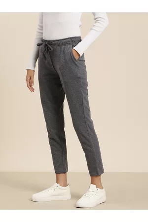 women solid mid rise track pants