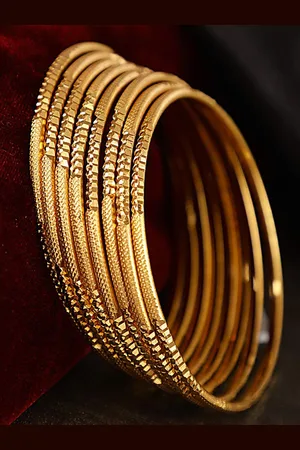 The Pari Set Of 8 Gold-Plated Bangles