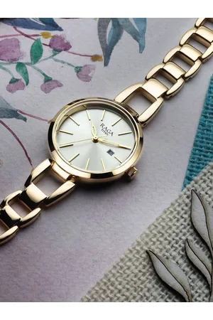 Titan Women Brass Dial & Stainless Steel Bracelet Style Straps Analogue Watch NP2642YM01