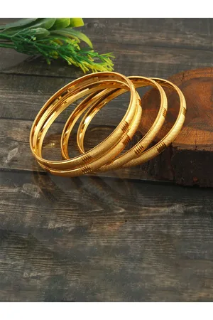 Jewar Mandi Set Of 4 Gold-Plated Cut Work Plane Design Bangles