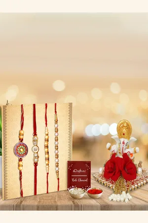 eCraftIndia Pack Of 4 Pearl Rakhi Set With Silver Lord Ganesha Statue