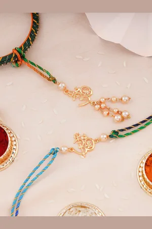 ESTELE Set Of 2 Om With Trishul Charm Rakhis With Roli Chawal