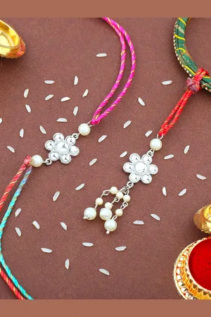 ESTELE Set Of 2 Stone-Studded Floral Charm Rakhi With Roli Chawal
