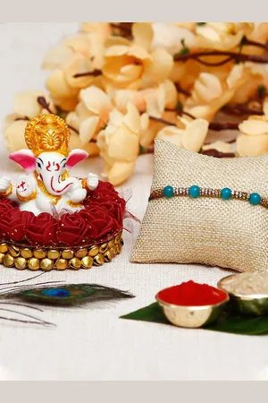 eCraftIndia Rakhi With Lord Ganesha Idol on Decorative Plate and Roli Chawal Pack