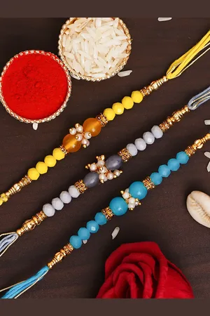 eCraftIndia Pack of 3 Designer Pearl Rakhis & Roli Chawal