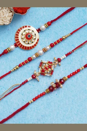 eCraftIndia Set of 4 Red & Golden Beads & Pearls Designer Rakhis With Roli Chawal Pack
