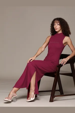 Bebe Season Staples High Neck Brand Logo Embellished Ribbed Side Slit Sheath Maxi Dress