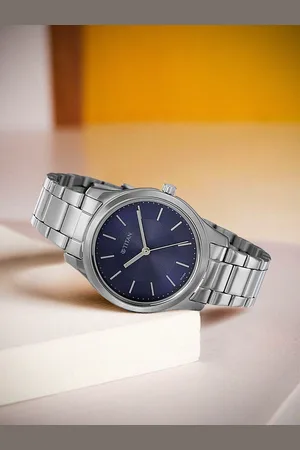 Titan Women Blue Dial & Steel Toned Bracelet Style Analogue Watch NP2596SM03