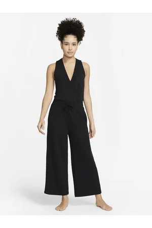 https://images.fashiola.in/product-list/300x450/myntra/103623428/black-yoga-dri-fit-french-terry-jumpsuit.webp