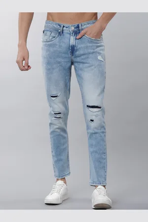 LocoMotive Men Blue Tapered Fit Mid-Rise Low Distress Stretchable Jeans