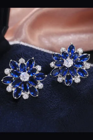 Designs & You Silver-Plated Floral American Diamond Studded Studs Earrings