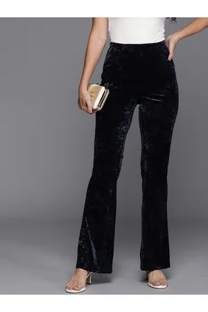 Black High-rise velvet trousers | Nina Ricci | MATCHES UK