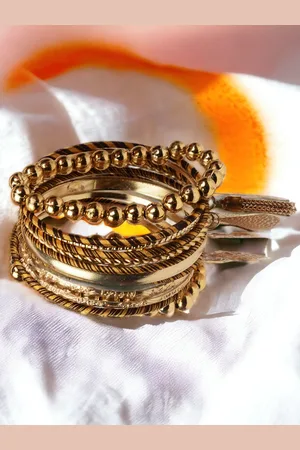 The Pari Set Of 8 Gold-Plated Bangles