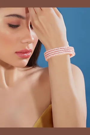 Rubans Set of 4 Women Rose Gold Plated Zirconia Stone Studded Bangles.