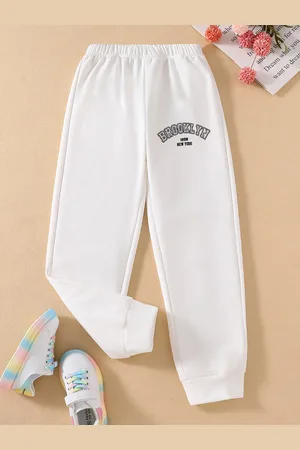 Stylecast Girls White Mid Rise Typography Printed Joggers