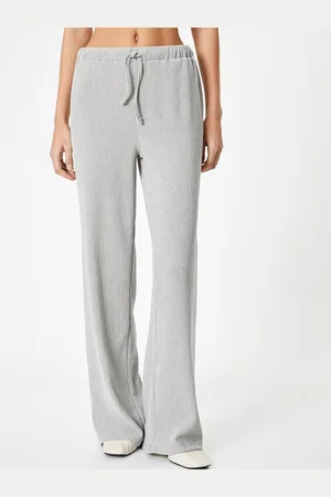 Koton Women Self Design Mid-Rise Flared Parallel Trousers