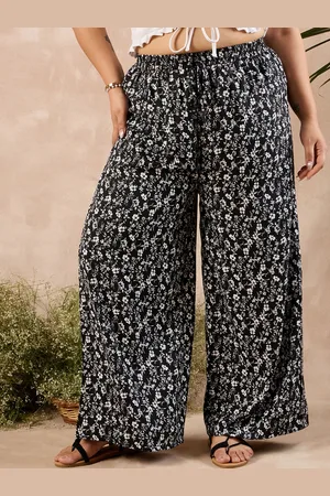 Berrylush Women Black Floral Printed Relaxed High-Rise Parallel Trousers
