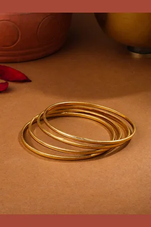 NVR Women Set Of 4 Gold-Plated Bangles