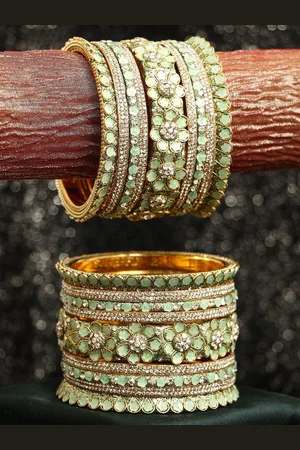 Adwitiya Collection Set of 9 Gold-plated Stone-Studded Bangles