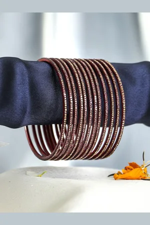 Adwitiya Collection Set Of 12 Stone-Studded Bangles